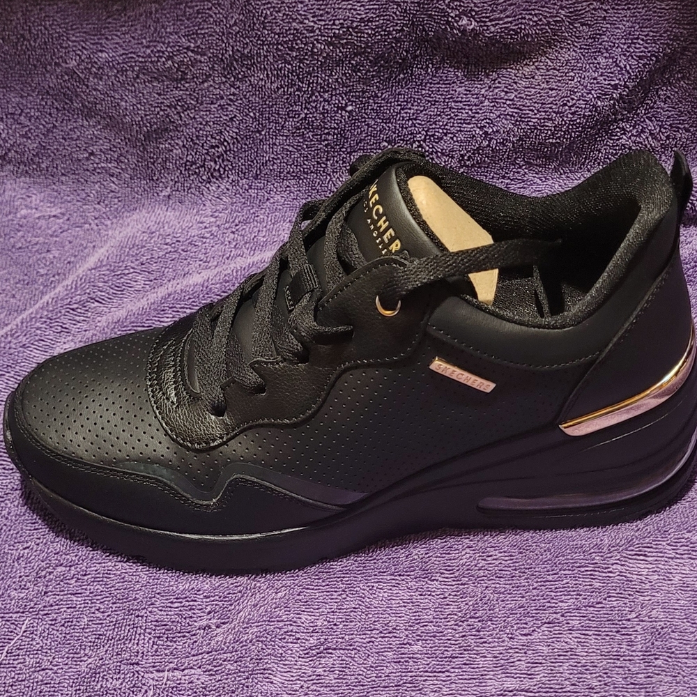 Skechers Black Sneakers with Gold Accent and Padded Collar